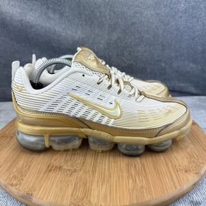Nike Women's Gold and White Sneakers